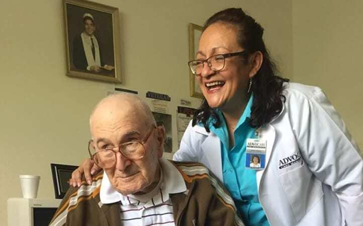 Doctor with hand over patient