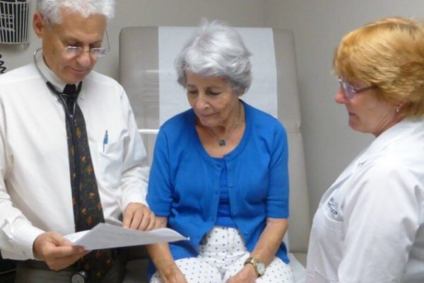 Doctors going over results with patient