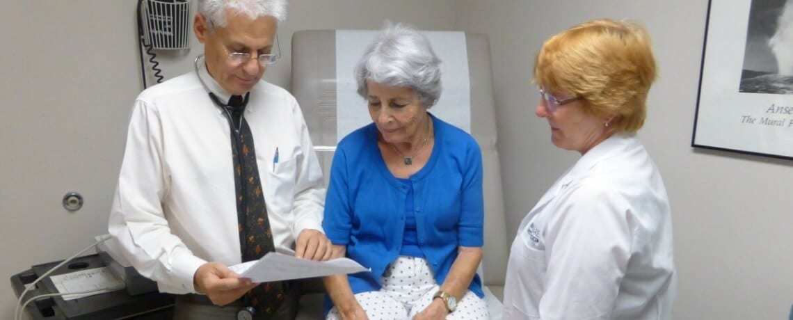 Doctors going over results with patient
