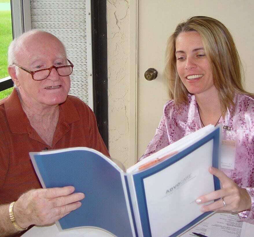 Woman and man reading book together