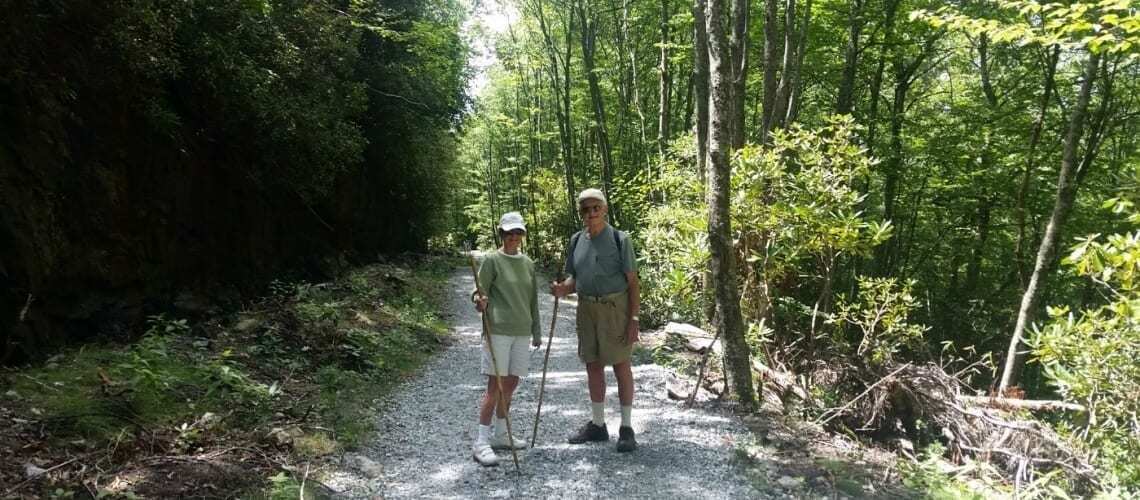 Elderly couple taking a hike